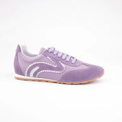 MrCalvano women's lavender leather and suede sneakers with white wavy details and gum sole, outer side-facing on white background.