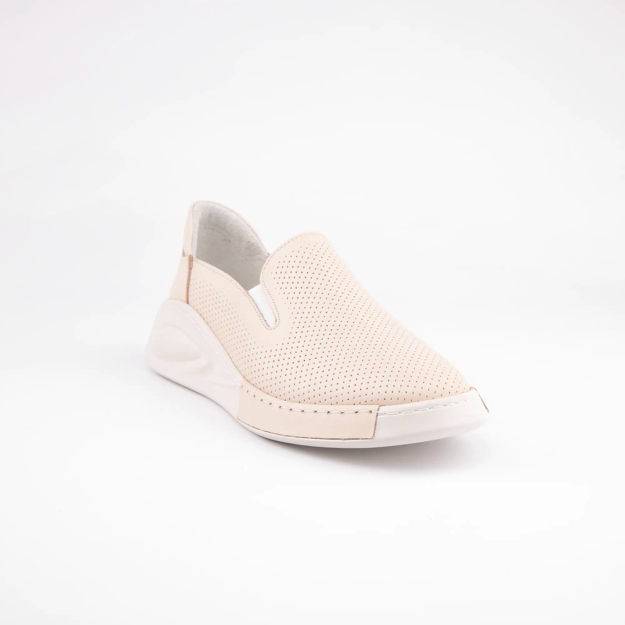 Calvano Malibu women's tan leather comfort sneakers with perforated upper and creamy off-white sculpted sole, single front view. 