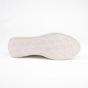 Calvano Malibu women's tan leather comfort sneakers with perforated upper and creamy off-white sculpted sole, sole view.