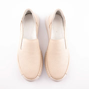 Calvano Malibu women's tan leather comfort sneakers with perforated upper and creamy off-white sculpted sole, pair up view.
