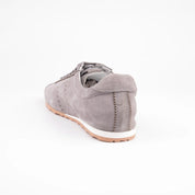 Highlighting the meticulous craftsmanship, this back-angle view of the MrCalvano Pismo Beach Grey leather sneakers for women prominently displays the robust heel counter,