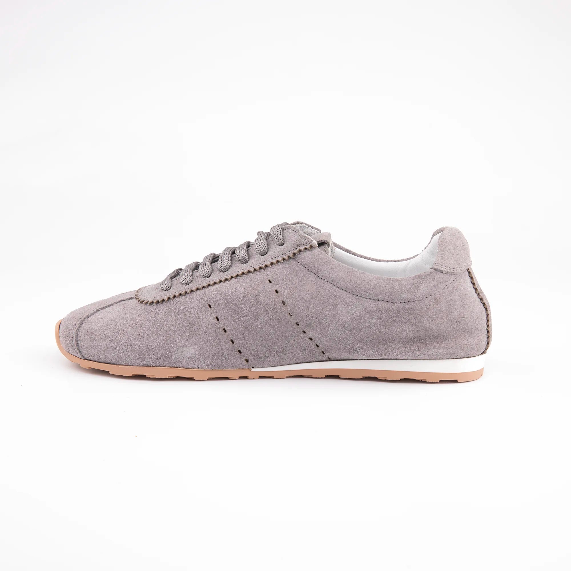 Highlighting the exceptional internal comfort of the MrCalvano Pismo Beach Grey leather sneakers for women, this refined side profile showcases the premium suede upper and subtle 