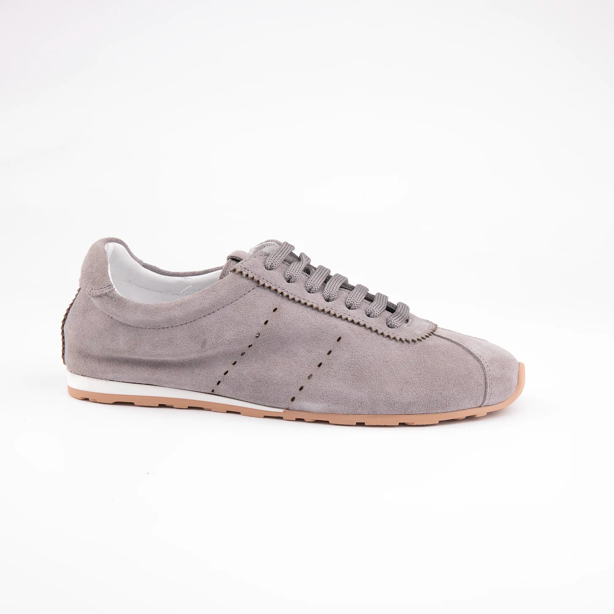 Presenting the MrCalvano Pismo Beach Grey sneakers, this detailed side profile captures the refined grey suede upper, featuring intricately braided laces and distinctive scall